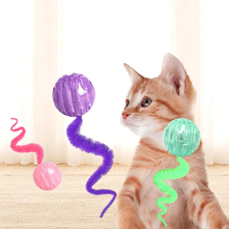 TPR interactive cat ball toy with attached worm tail in green, pink or purple colours