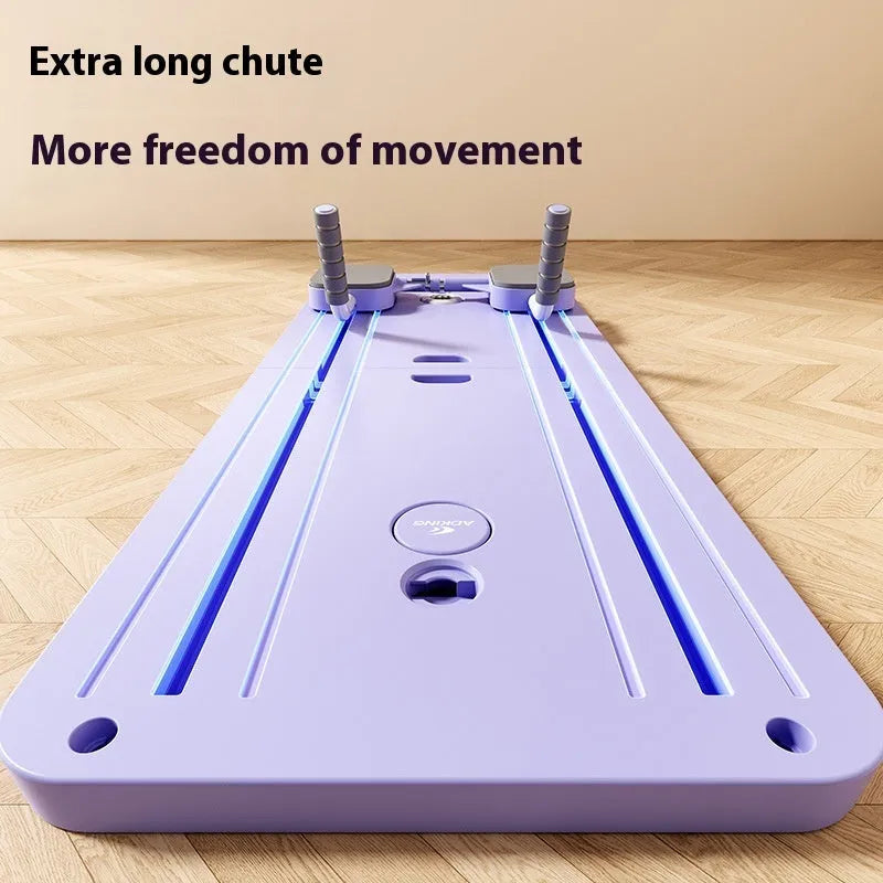 Purple automatic rebound abdominal exercise wheel on a grey floor for home fitness training.