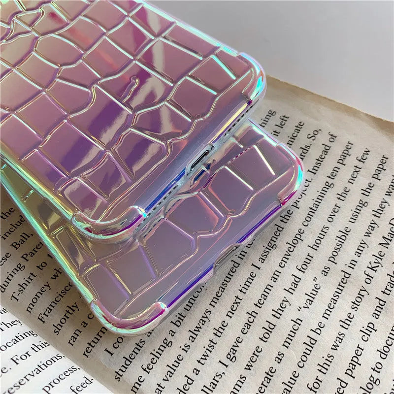 Silver laser finish silicone iPhone case showing glossy texture and protective design