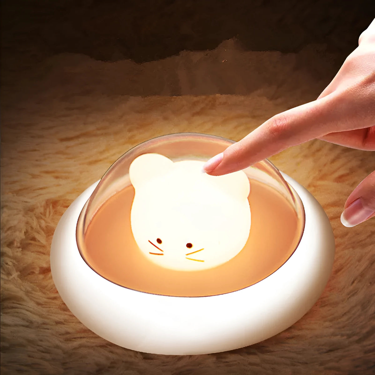 Space Moe Mouse children's bedroom night light in blue with push switch and warm LED glow on a bedside table
