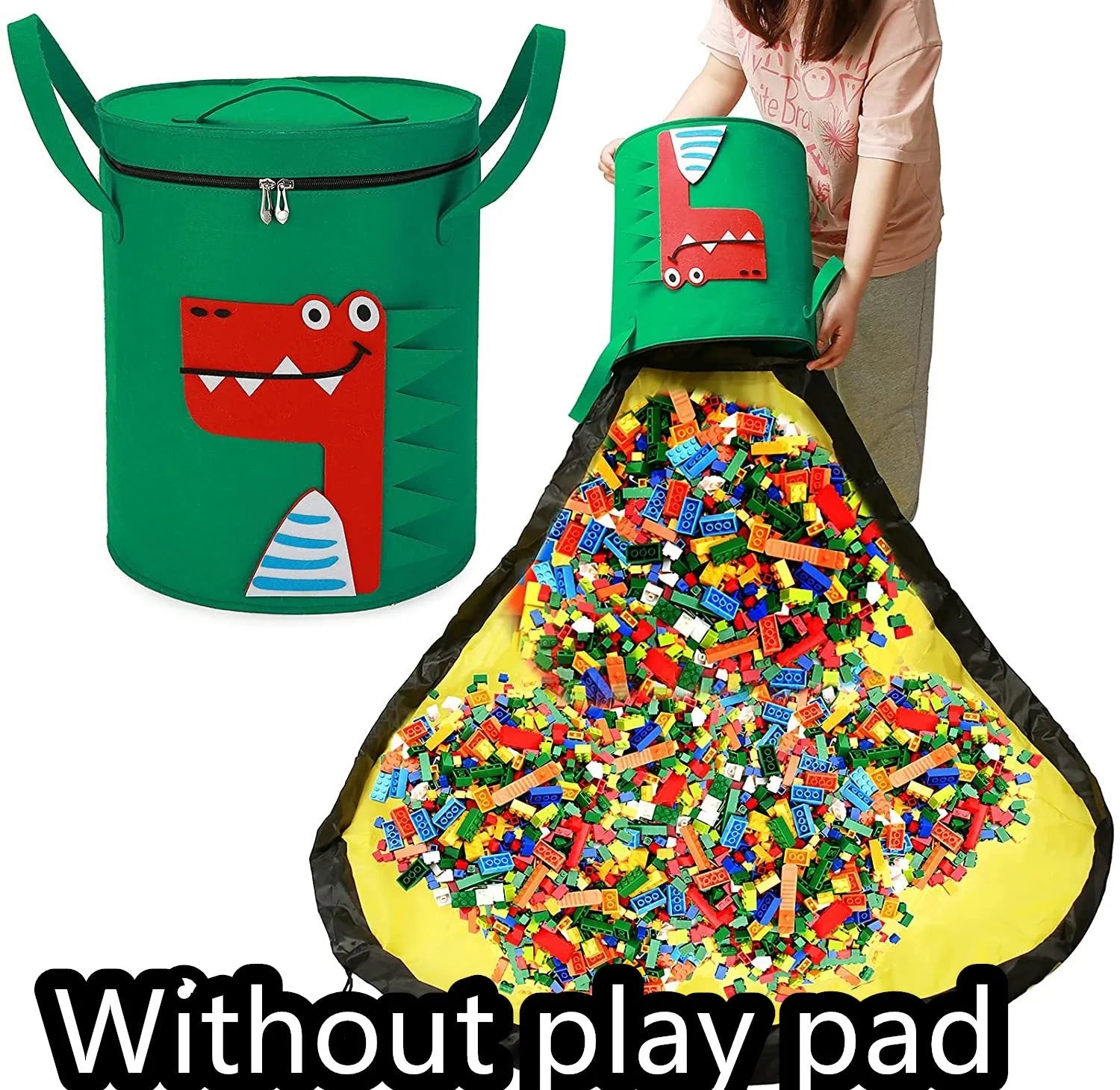 Green felt cube storage bag with pull rope, laid flat as a play mat next to toys.