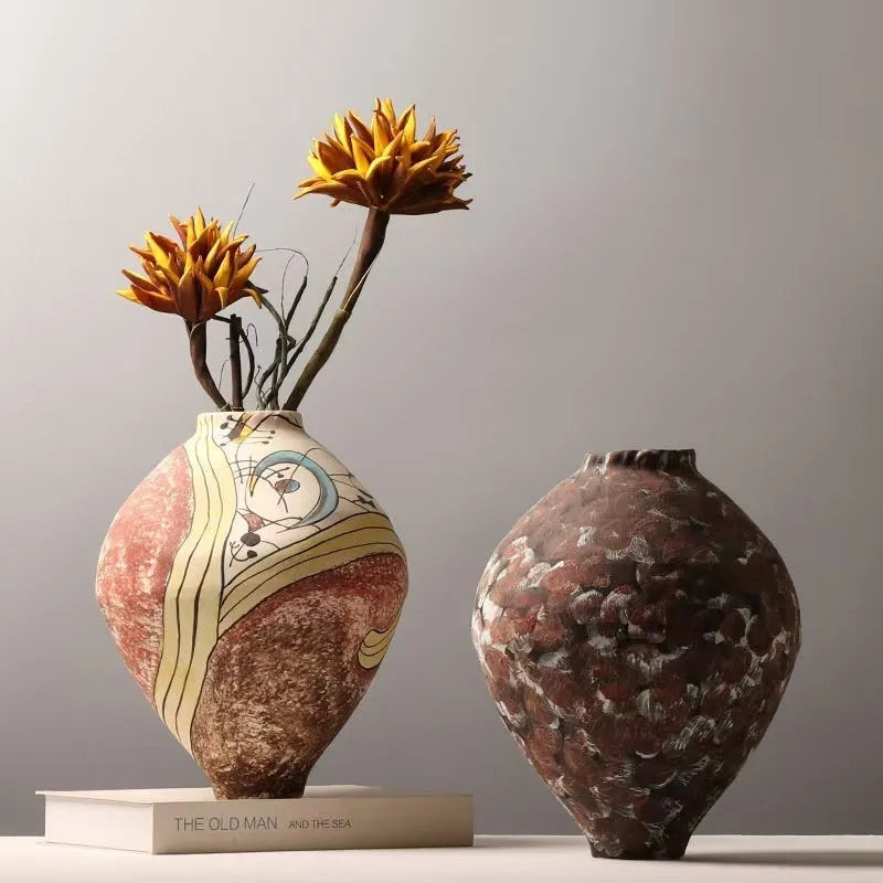 White ceramic decorative vase with hand-painted finish in modern simplicity style for tabletop display