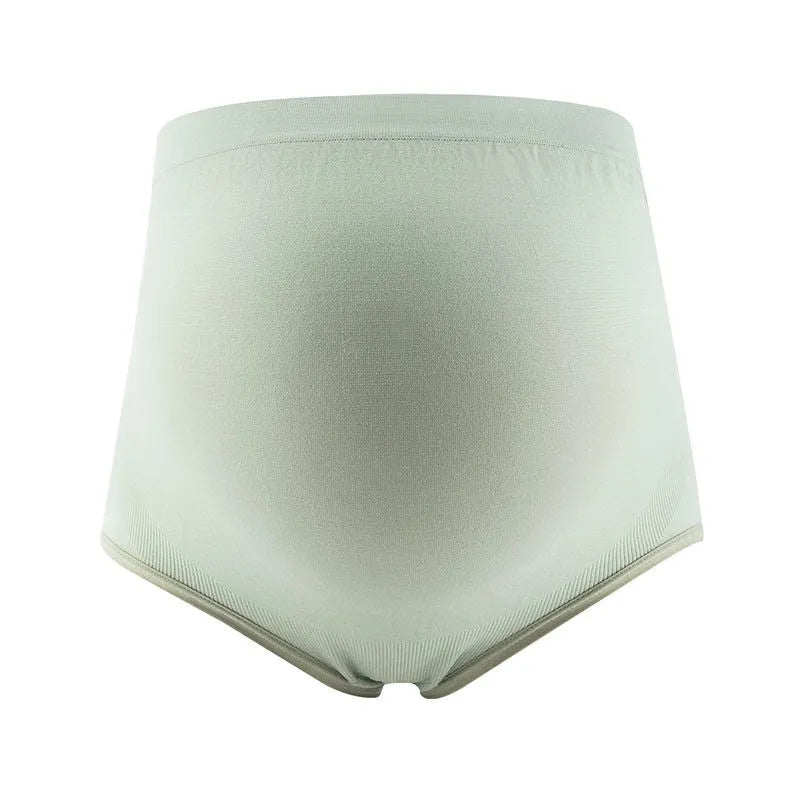 Thin breathable seamless maternity underwear with high-waist belly support in Cameo Brown colour on a female mannequin