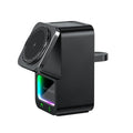 Black and white 5-in-1 Bluetooth speaker with wireless charging station showing magnetic Qi charging area
