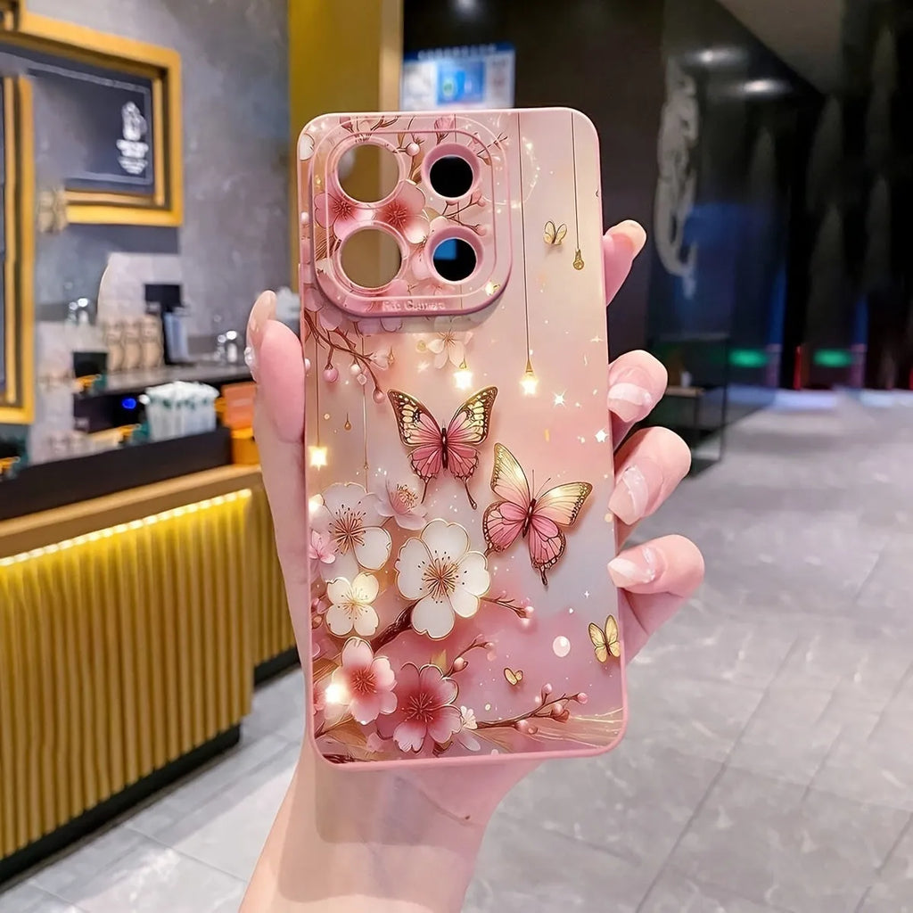 TPU soft shell phone case with butterfly design in pink for iPhone 15 Pro Max, showing protective edges and sprayed finish