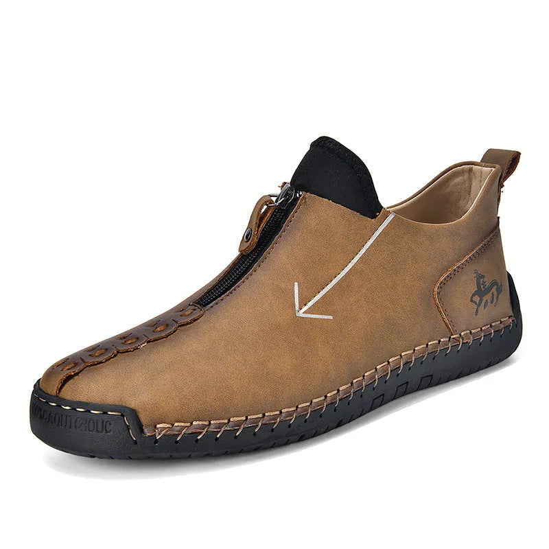Men's black casual leather boots with a front side zipper and a hand-stitched rubber sole.