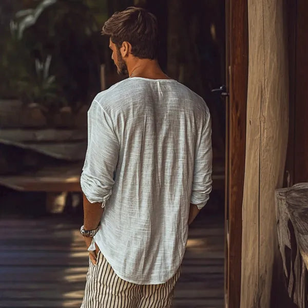 Men's beige slim fit V-neck long sleeve t-shirt made from hemp blend fabric on a hanger.