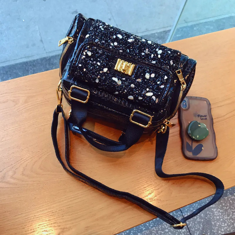 Large capacity black cowhide shoulder bag with diamond pattern for women, suitable for leisure travel and casual daily use.