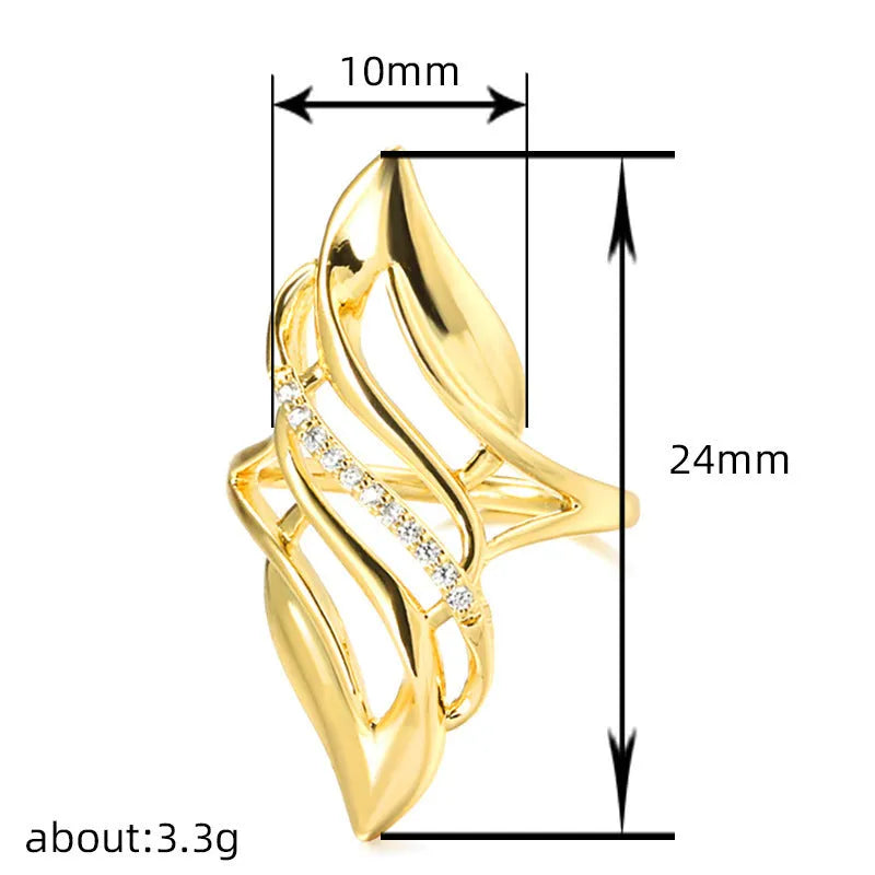 Women's exaggerated curve ring in Q611 gold colour with zircon treatment on copper