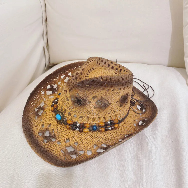 Women's brown straw cowboy sun hat with stitching detail on white background