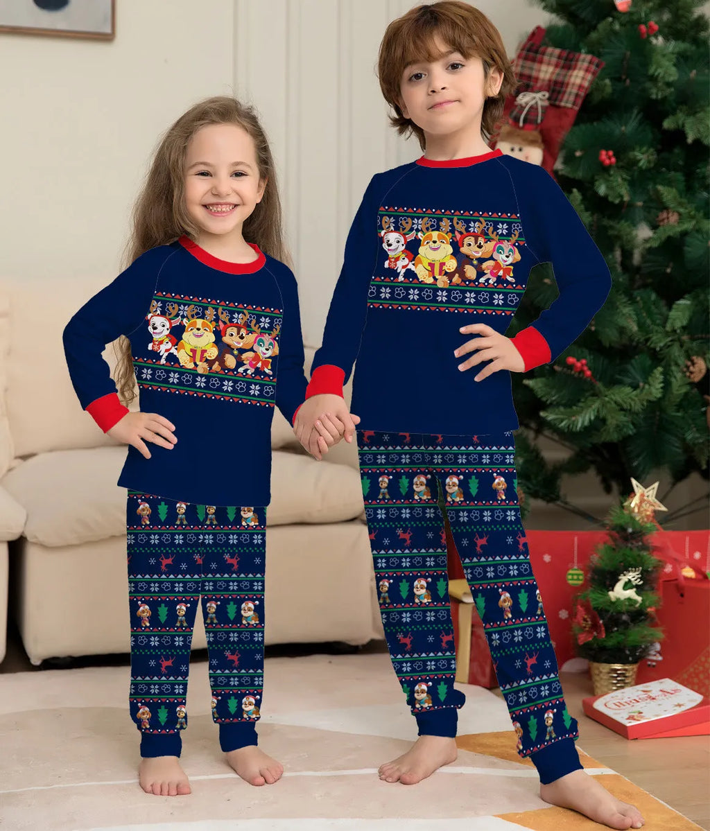 Red plaid family pyjamas set with cartoon deer print for adults, children, baby, and dog.