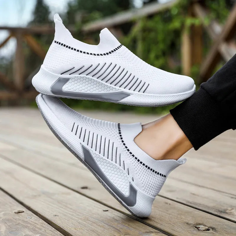 Men's striped mesh slip-on sneakers with flyknit upper in black and white colour option