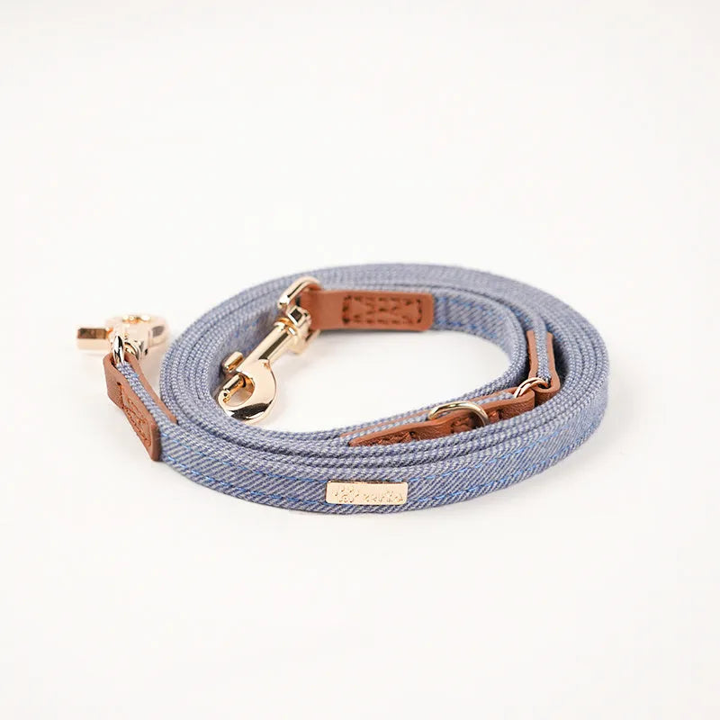 Anti-lost nameplate mohair dog collar in cement gray with matching hand holding rope for Shiba Inu