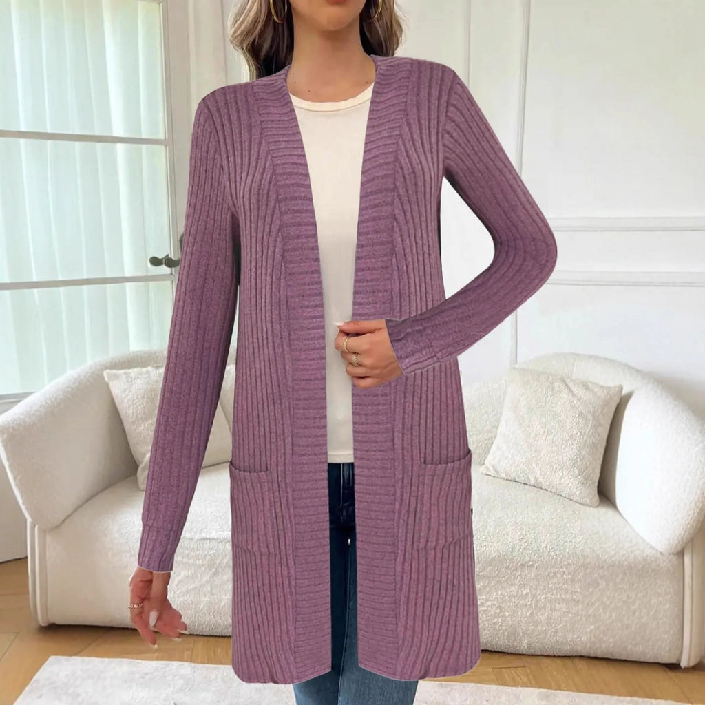 Long sleeve loose-fit knitted cardigan jacket with pockets in wine red colour.