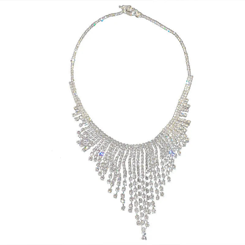Silver diamond tassel necklace with geometric alloy pendant and ball bead chain on a light background
