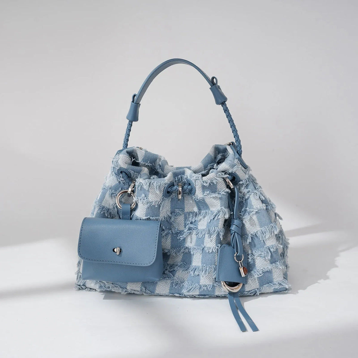 First layer cowhide one-shoulder underarm bag with denim contrast panels, horizontal square shape