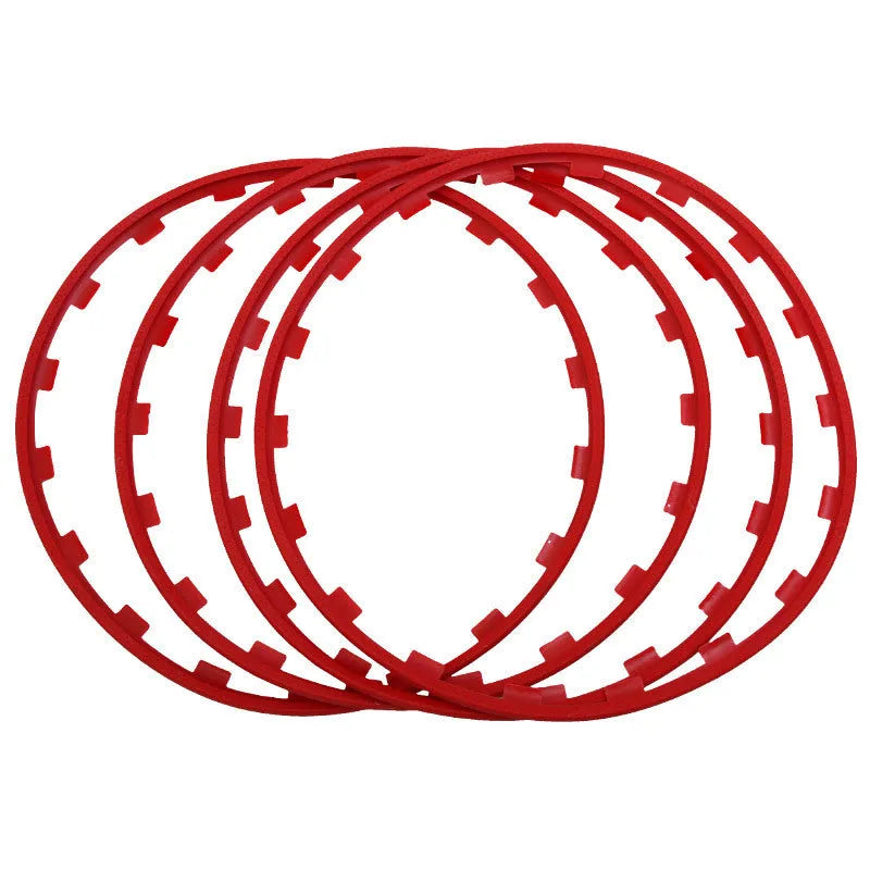 Set of four coloured nylon wheel hub guard rings for alloy wheel protection.