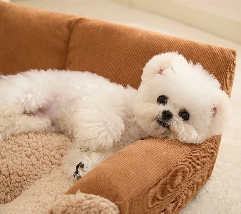 Grey pet nest cushion mat for small dog, shown in medium size with dimensions 58cm long by 43cm wide.