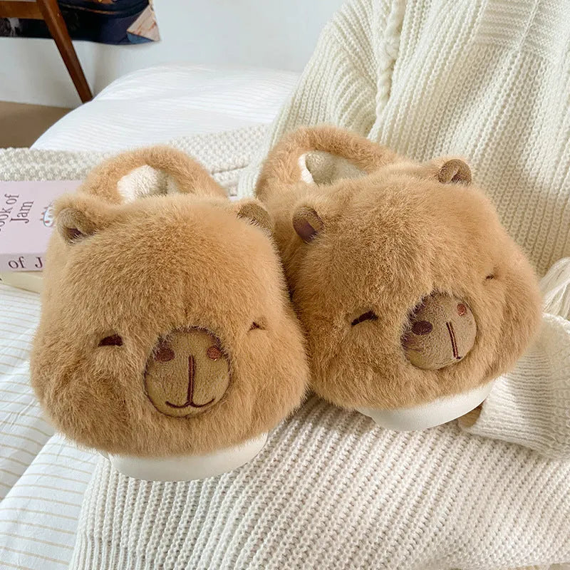 Women's light brown winter slippers with plush upper, artificial wool lining, and cartoon pattern in UK sizes 36-41