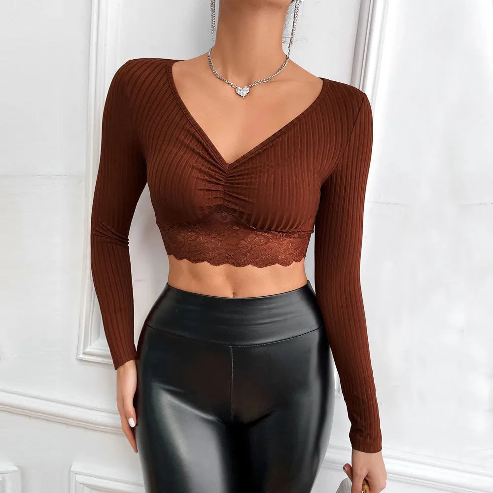 Solid colour women's slim fit long sleeve polyester top in black, front view