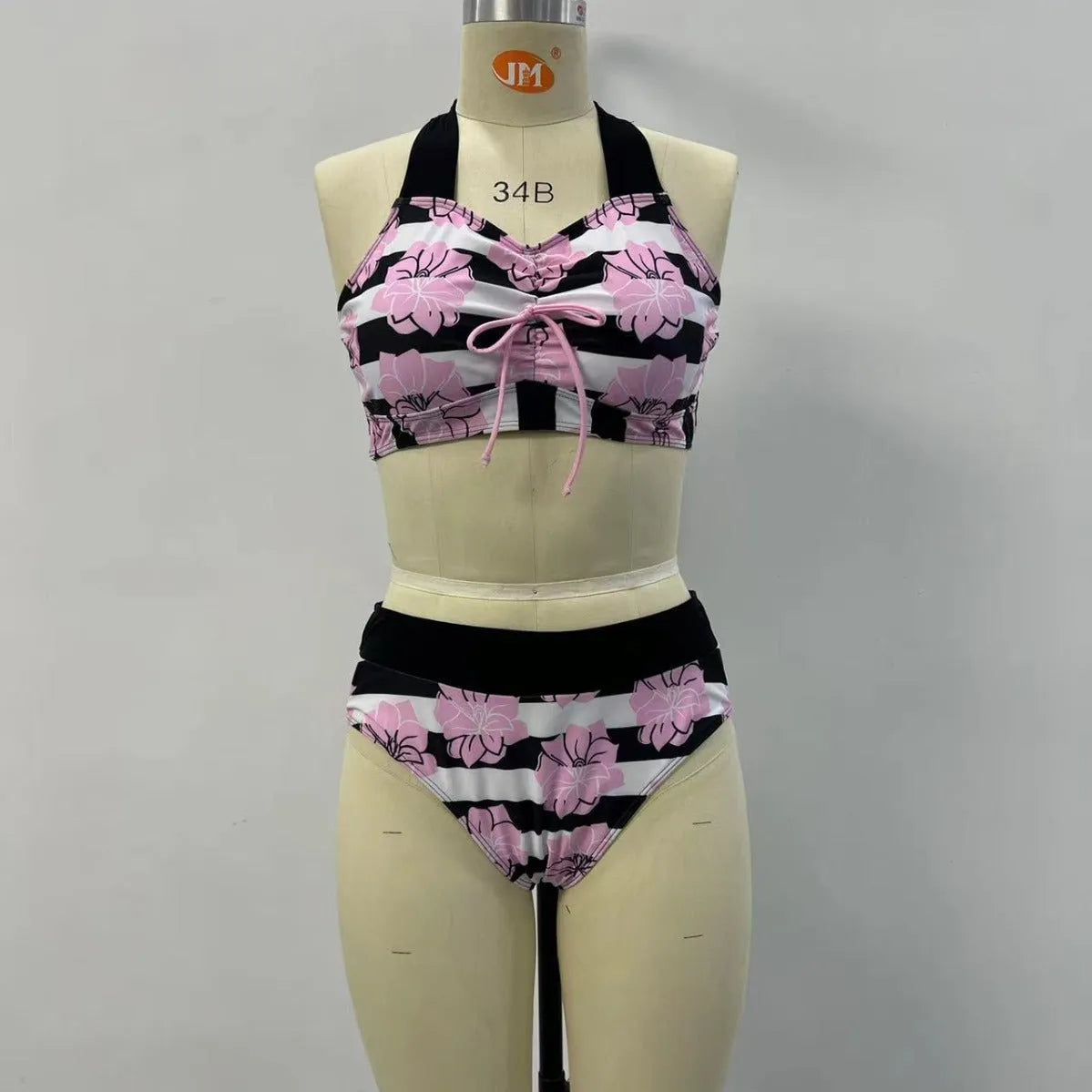 Black women's split bikini with printed belly coverage design for swimming