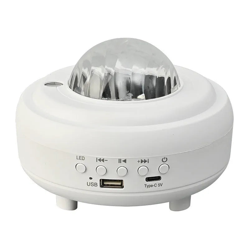 White galaxy star projector night light projecting blue star patterns on wall