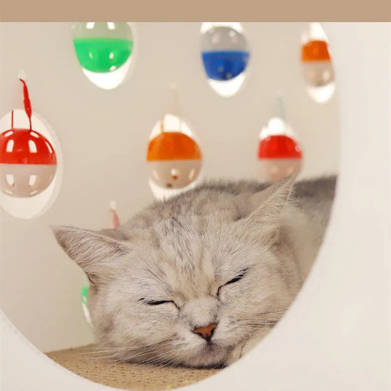 Grey and beige 3-in-1 cat activity centre with sisal scratch pad, round felt nest, and tunnel with dangling bell ball