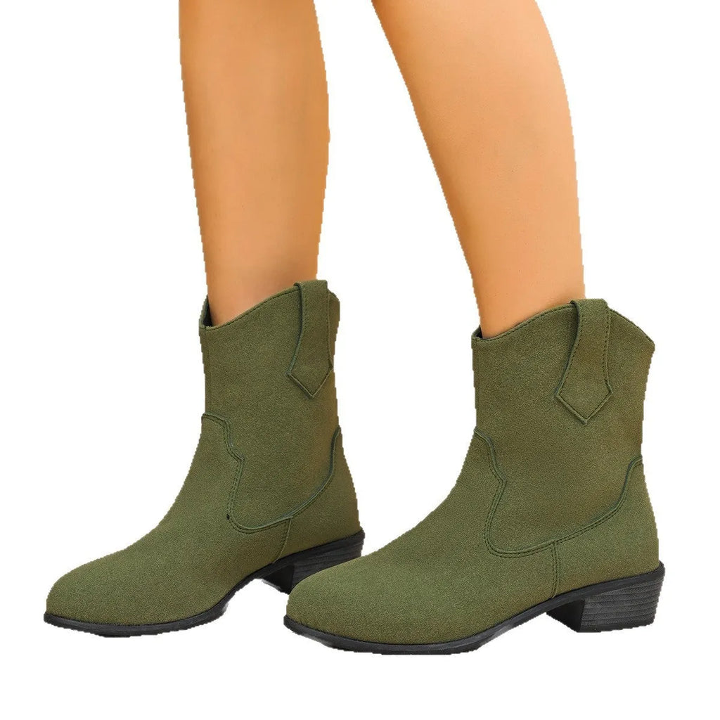 Pointed British style mid heel boots in black PU upper with rubber sole