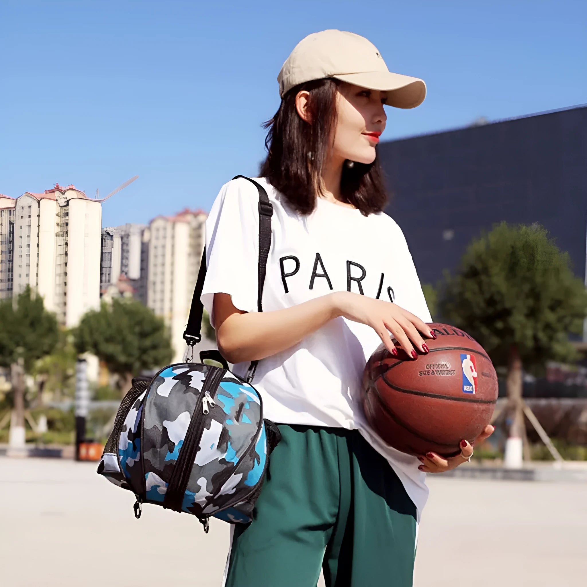 Oxford cloth basketball training bag showing 9-litre capacity and shoulder strap options