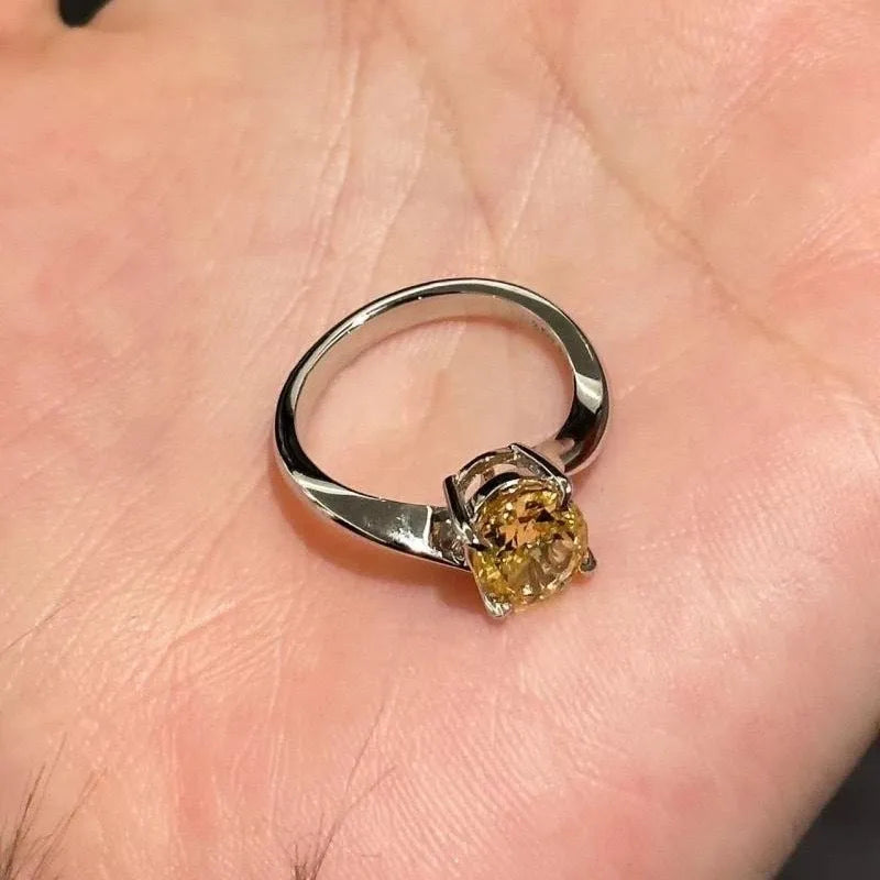 Yellow rock sugar crystal women's ring in polished copper on a hand