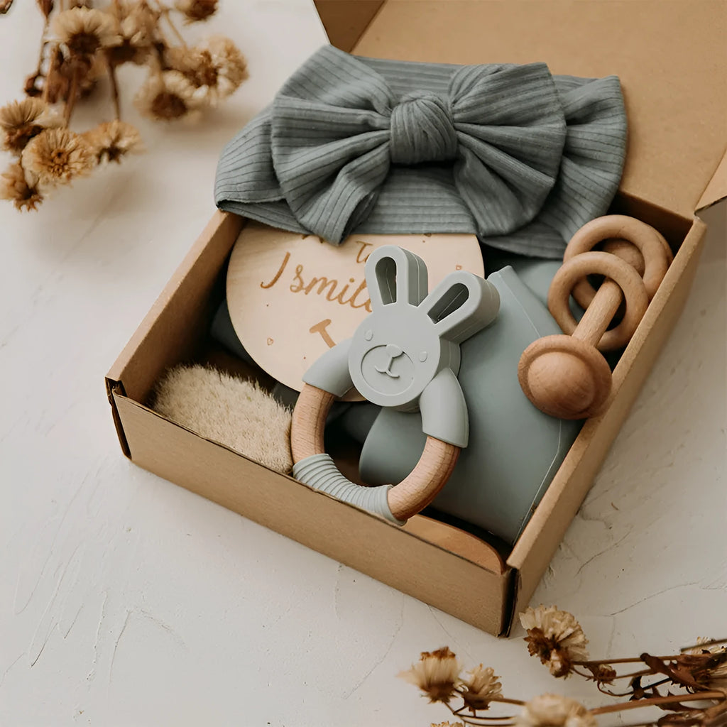 Newborn baby shower toy set in peach colour, six bath toys made from wood and chemical fibre