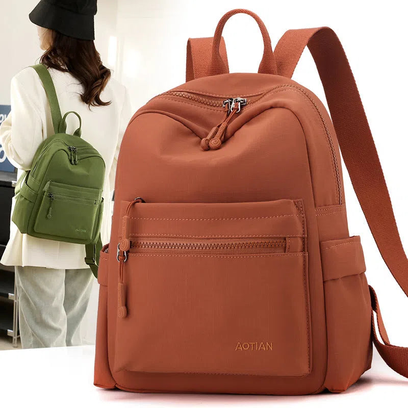 Women's Oxford cloth casual travel backpack in Classic Black with adjustable straps and casual design