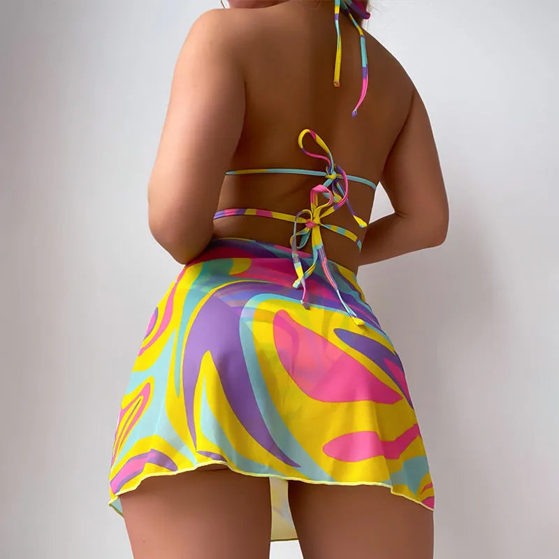 Yellow striped halter-neck lace-up swimsuit top with matching skirt and shorts for women