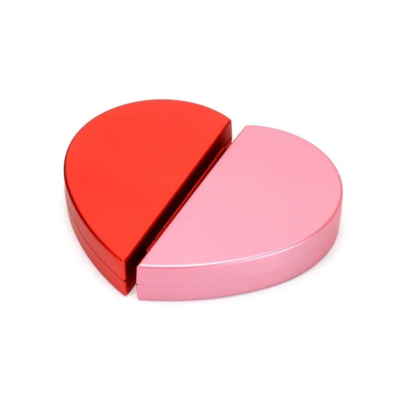 Red rotating 3D heart-shaped plastic ring box with a rose, open to show ring placement.