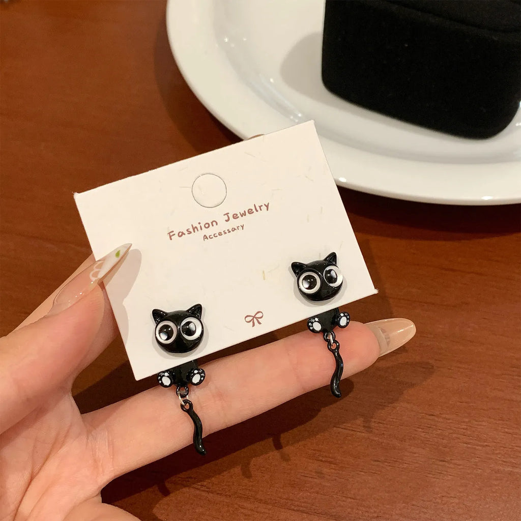 Black cat ear clip on earring for women with kitten ear animal design and no piercing needed