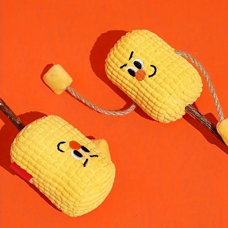 Natural corn cob and wood cat chew toy with catnip for dental hygiene, shown with dimensions 7cm by 6cm by 15cm.