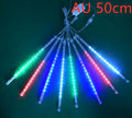 Outdoor waterproof LED meteor shower lights in garden installation showing realistic falling star lighting effects