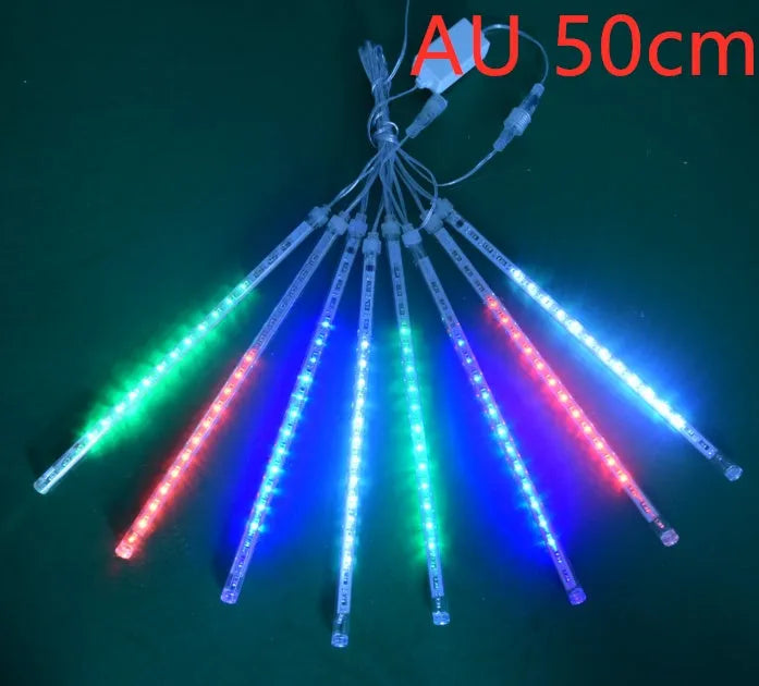 Outdoor waterproof LED meteor shower lights in garden installation showing realistic falling star lighting effects