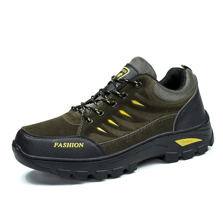 Men's suede hiking shoes with rubber sole in green colour showing mid-top design and lace-up closure