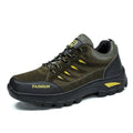 Men's suede hiking shoes with rubber sole in green colour showing mid-top design and lace-up closure