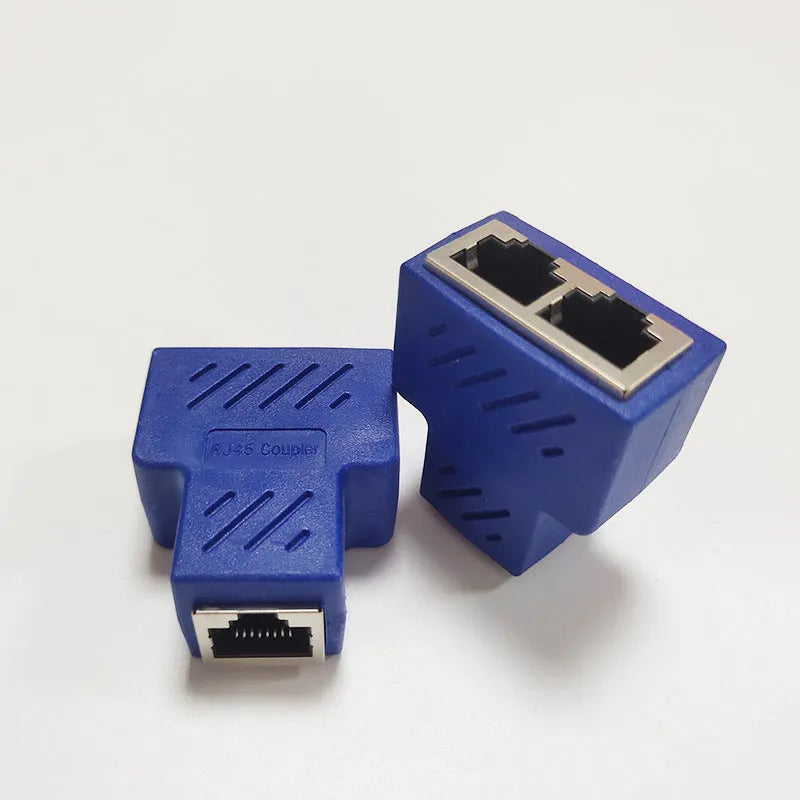 A white RJ45 network splitter adapter with one male and two female Ethernet ports.