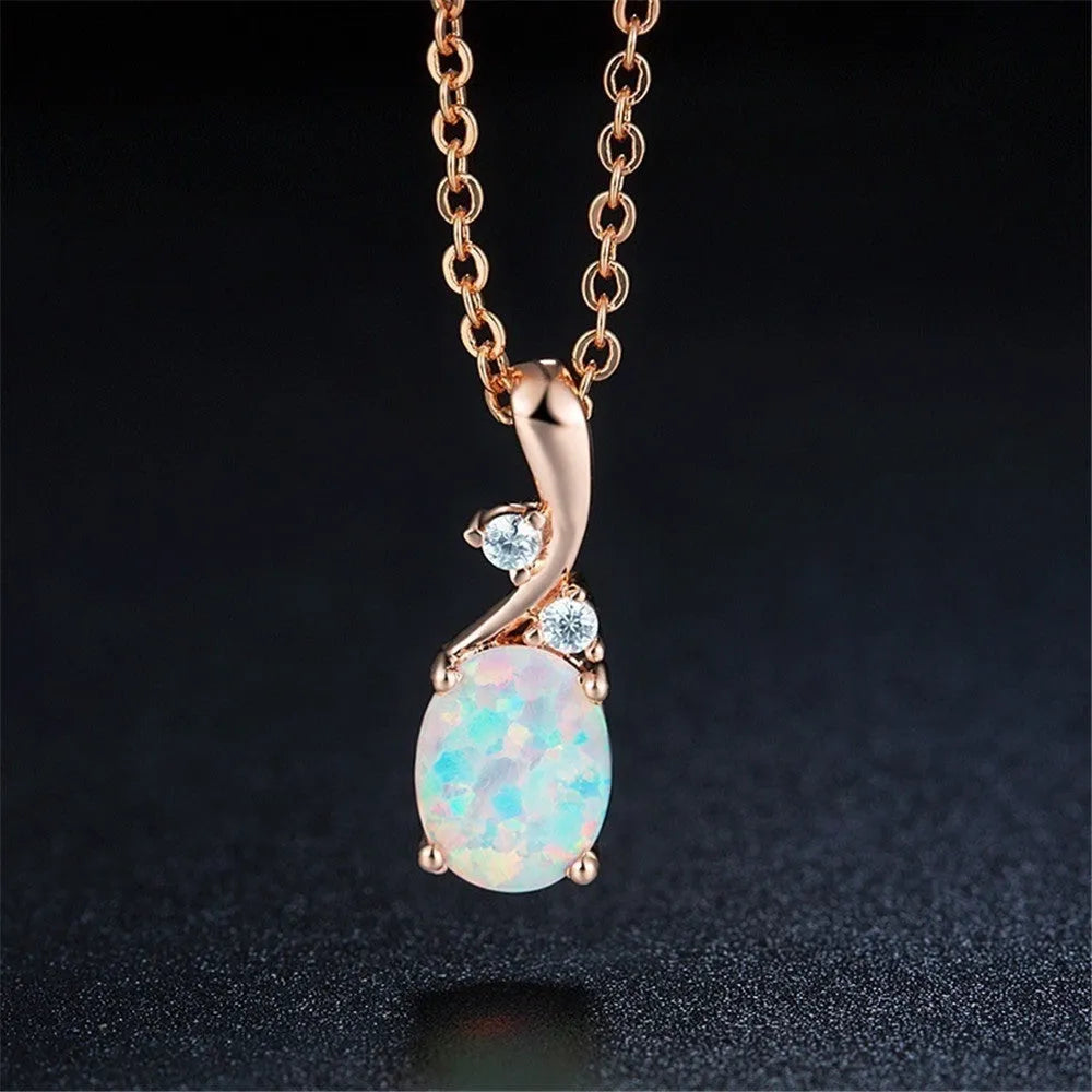 Water drop shaped opal pendant necklace on adjustable O-shaped chain in rose gold electroplated finish