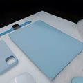 Colorful 16 inch laptop sleeve in Dream Blue with sticker style design for MacBook