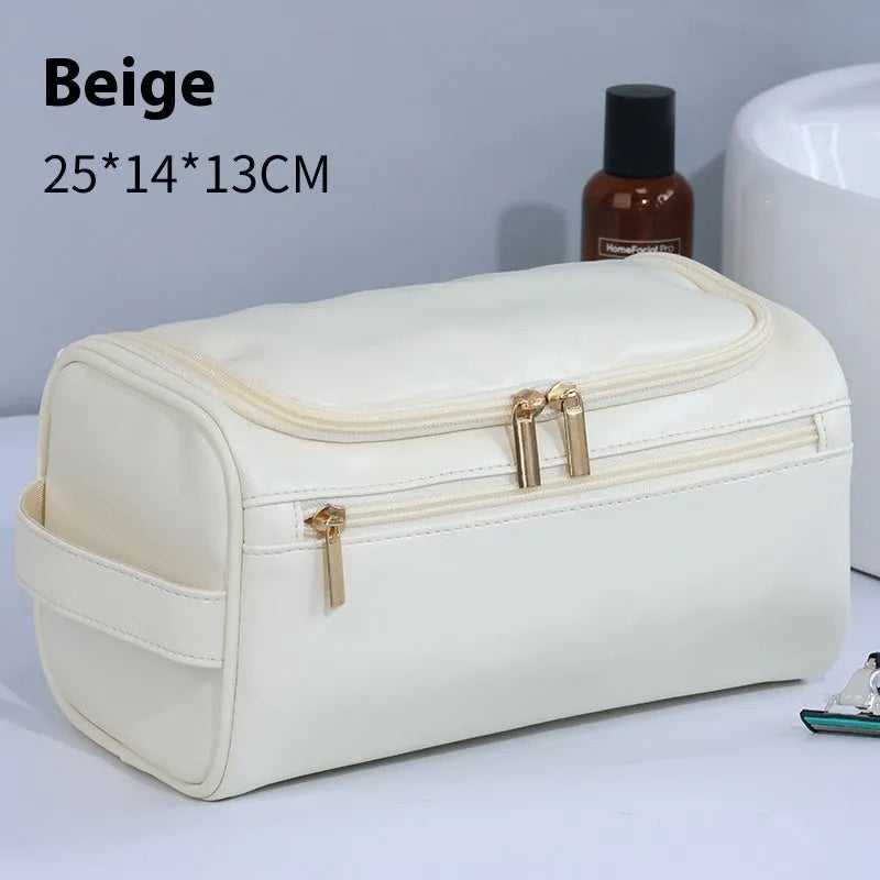 Large waterproof cosmetic bag in retro style, shown in brown PU leather and navy blue Oxford cloth options.