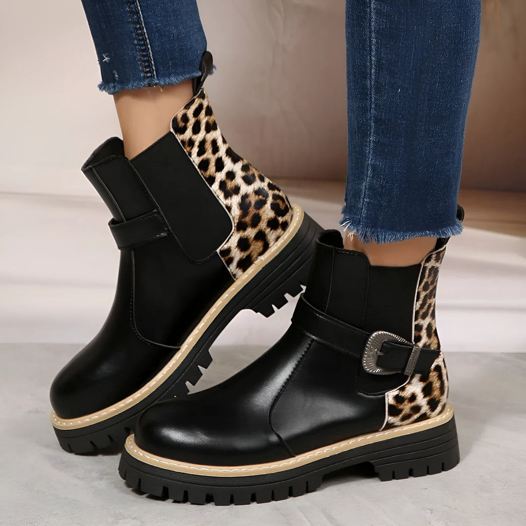 Plus-size women's black leopard print ankle boots with metal buckle, round toe, and mid-heel