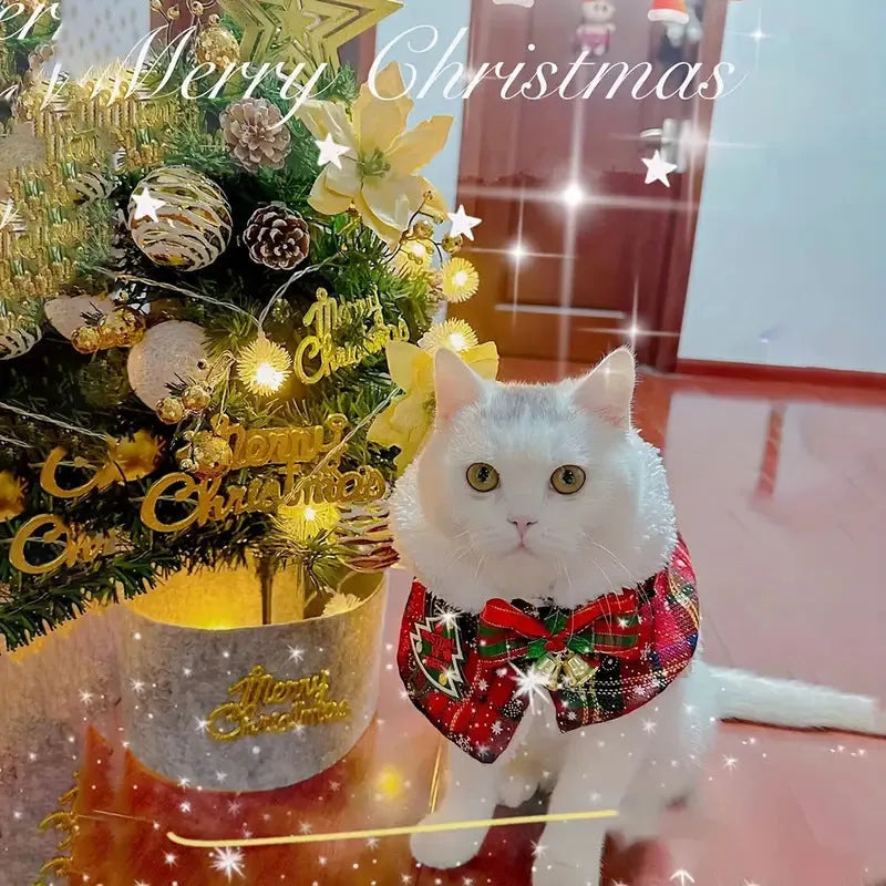 Pet warm scarf for cat or dog in festive red background design with bell motif, made from soft polyester.