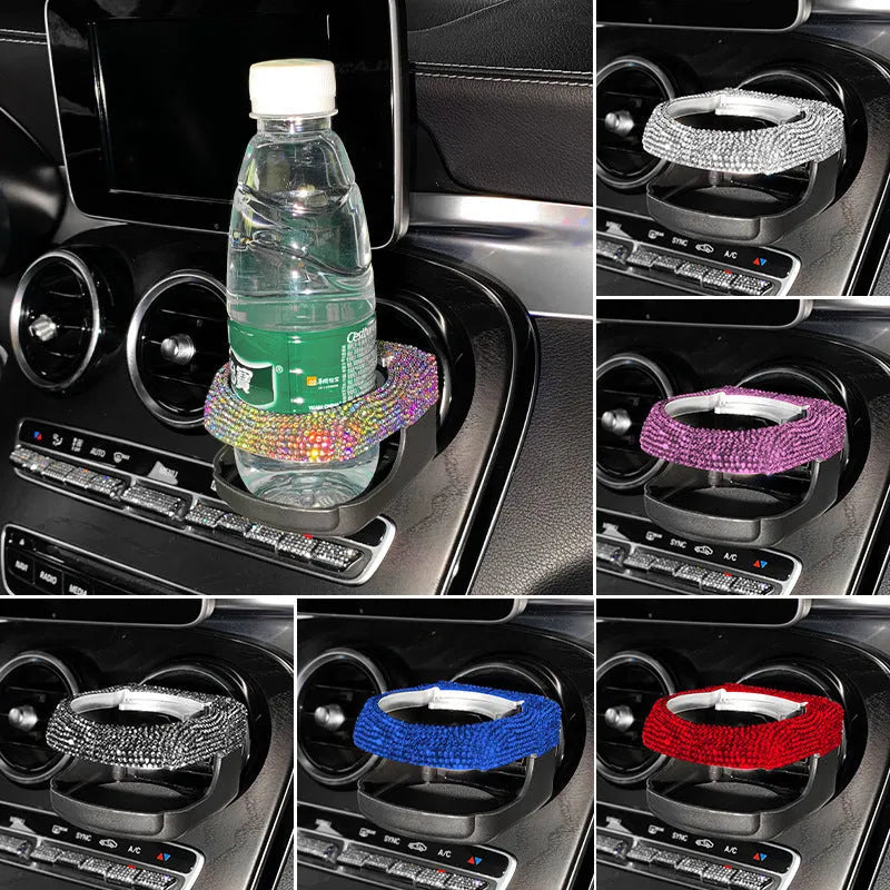 Rhinestone-encrusted white car cup holder bracket mounted on a vehicle air vent.