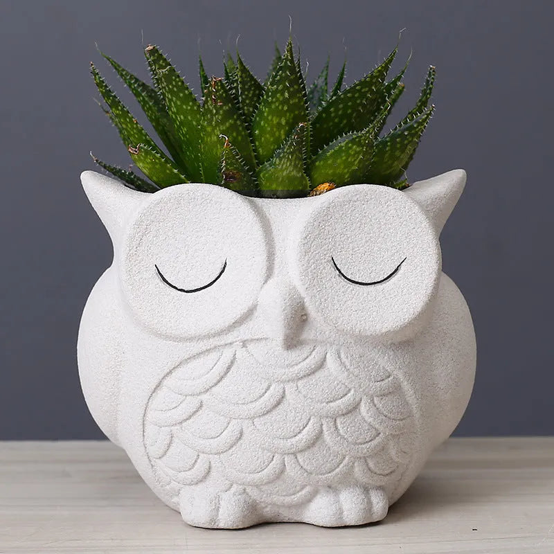 Handmade ceramic succulent pot with cartoon owl design in frosted pastel colour
