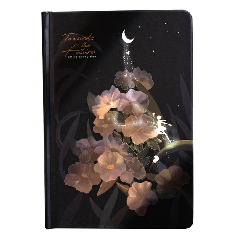 A5 hardback notebook with luminous cover open to show colour illustrated pages.