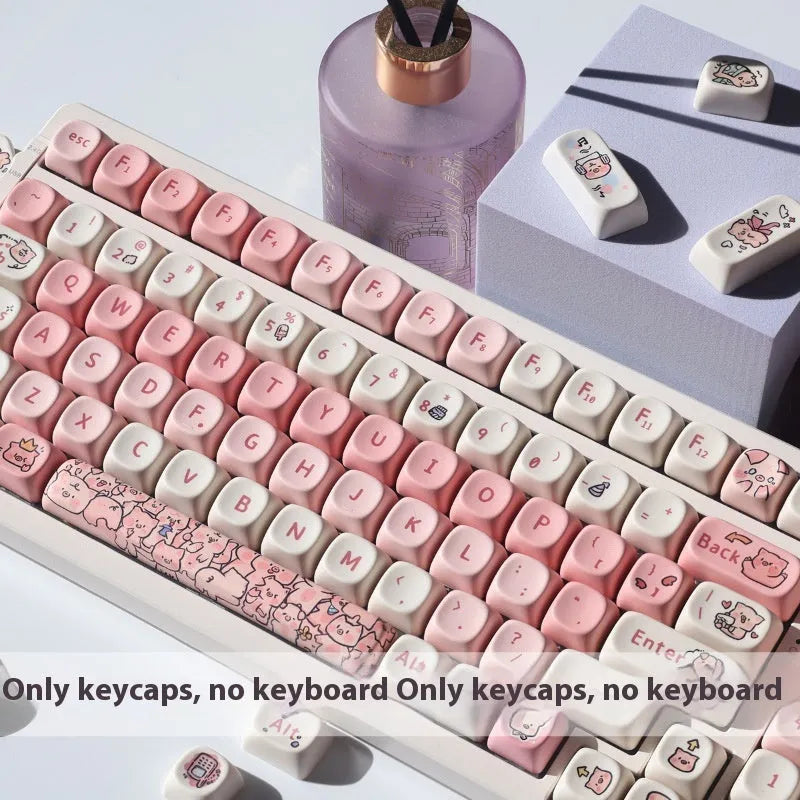 Pink fragrant pig design PBT plastic keycap for mechanical keyboards shown with keycap puller.
